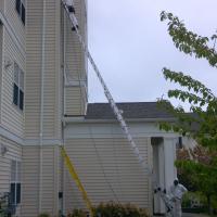 Cleaning dryer vent via ladder